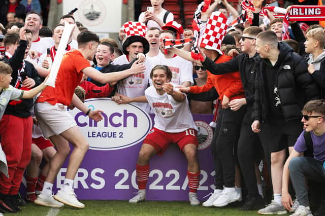 Stirling Albion celebrate winning the cinch League Two title after victory over Annan.