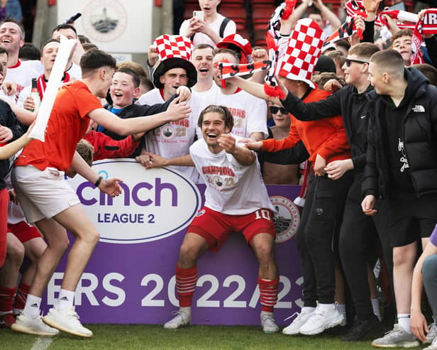 Stirling Albion celebrate winning the cinch League Two title after victory over Annan.