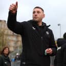 Finn Russell, left, of Bath in conversation with Jamie George of Saracens ahead of the Gallagher Premiership Rugby match between Bath Rugby and Saracens at The Recreation Ground on April 26, 2024 in Bath, England. (Photo by Michael Steele/Getty Images)