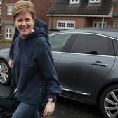 Nicola Sturgeon arrives at her home following resigning as First Minister. Picture: Jeff J Mitchell/Getty Images