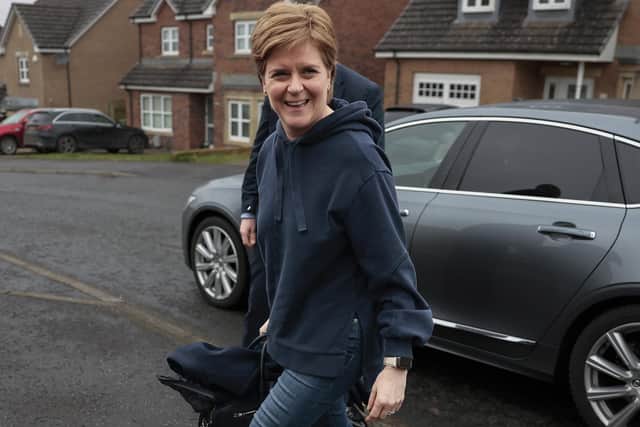 Nicola Sturgeon arrives at her home following resigning as First Minister. Picture: Jeff J Mitchell/Getty Images