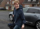 Nicola Sturgeon arrives at her home following resigning as First Minister. Picture: Jeff J Mitchell/Getty Images