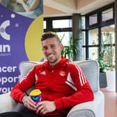Dons defender Angus MacDonald aims to further support the charity throughout his time in Aberdeen.