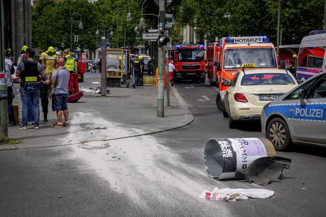 Picture shows the sccenery after a car crashed into a crowd of people in central Berlin, Germany, Wednesday, June 8, 2022. (AP Photo/Michael Sohn)