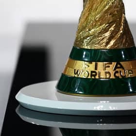 A picture taken on March 31, 2022 shows a detail of the World Cup Trophy during the FIFA Congress in the Qatari capital Doha. - The countdown towards the most controversial World Cup in history begins tomorrow as the draw for Qatar 2022 takes place in Doha 2022, less than eight months befor the start of the tournament itself. (Photo by FRANCK FIFE / AFP) (Photo by FRANCK FIFE/AFP via Getty Images)