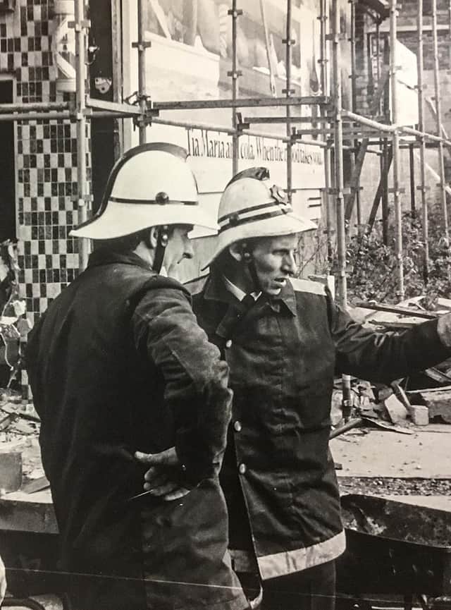 As well as an MBE, Douglas Leitch, pictured right with a colleague, received two bravery awards