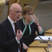 Nicola Sturgeon, seen looking on as John Swinney speaks in the Scottish Parliament, must be held to account by a strong opposition party over issues like poverty, says Susan Dalgety (Picture: Fraser Bremner/Scottish Daily Mail/via PA)