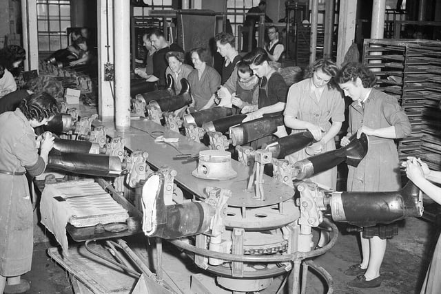 Making Wellington boots in the North British Rubber Company's works at Castle Mills in 1951.