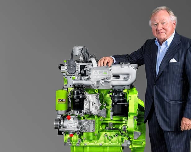 Lord Bamford with JCB’s pioneering hydrogen engine for agricultural and construction machinery.