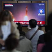A TV screen showing a news program reporting about North Korea's missile launch is seen at the Seoul Railway Station in South Korea. Picture: AP Photo/Lee Jin-man