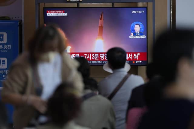 A TV screen showing a news program reporting about North Korea's missile launch is seen at the Seoul Railway Station in South Korea. Picture: AP Photo/Lee Jin-man