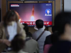 A TV screen showing a news program reporting about North Korea's missile launch is seen at the Seoul Railway Station in South Korea. Picture: AP Photo/Lee Jin-man