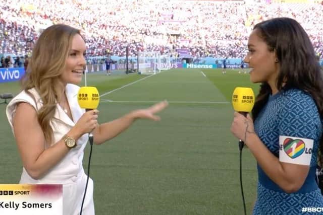 While members of the Wales and England squads never wore their LGBTQ+ support on their sleeves, BBC presenter Alex Scott, right, donned a OneLove armband (Picture: BBC)