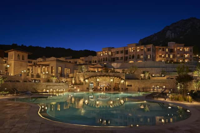 Cap Vermell Grand Hotel and pool at night