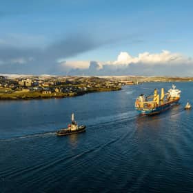 A vessel arriving in Lerwick, Shetland to deliver turbine components for the Viking Wind Farm.