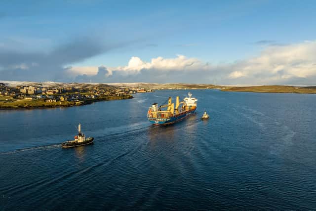A vessel arriving in Lerwick, Shetland to deliver turbine components for the Viking Wind Farm.