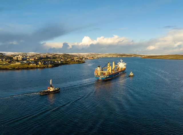 A vessel arriving in Lerwick, Shetland to deliver turbine components for the Viking Wind Farm.