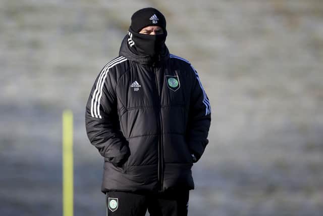 Ange Postecoglou wraps up at training on Tuesday as Celtic prepare for the visit of St Mirren. (Photo by Craig Williamson / SNS Group)