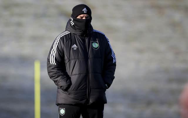 Ange Postecoglou wraps up at training on Tuesday as Celtic prepare for the visit of St Mirren. (Photo by Craig Williamson / SNS Group)