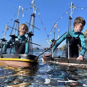 Ollie Ferguson, 13, (right) and his brother Harry, 11, from Turriff, Aberdeenshire, who built replica boats to circumnavigate Antarctica. Picture: MacNeill Ferguson/PA Wire