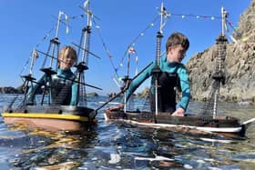 Ollie Ferguson, 13, (right) and his brother Harry, 11, from Turriff, Aberdeenshire, who built replica boats to circumnavigate Antarctica. Picture: MacNeill Ferguson/PA Wire