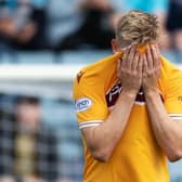 Motherwell debutant Juhani Ojala looks dejected as the Fir Park side lose to Dundee in the Premier Sports Cup. Picture: SNS