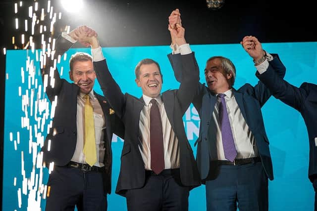 Reform UK Chairman David Bull, left, and new convert Robert Jenrick - both former Tories - with Reform UK leader Nigel Farage earlier this month (Picture: Christopher Furlong/Getty Images)