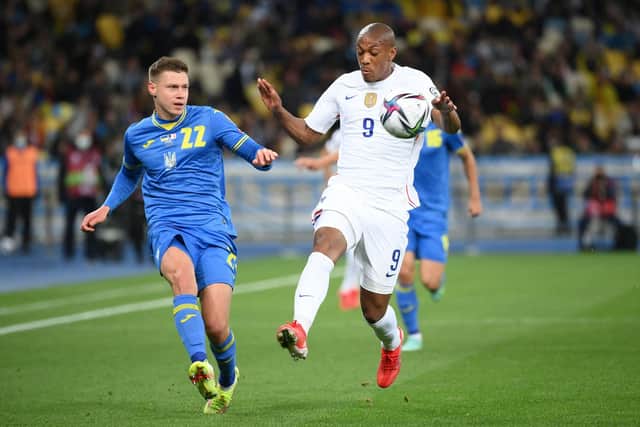Ukraine defender Mykola Matviyenko (left) in action against French striker Anthony Martial during a World Cup qualifying match. (Photo by FRANCK FIFE/AFP via Getty Images)