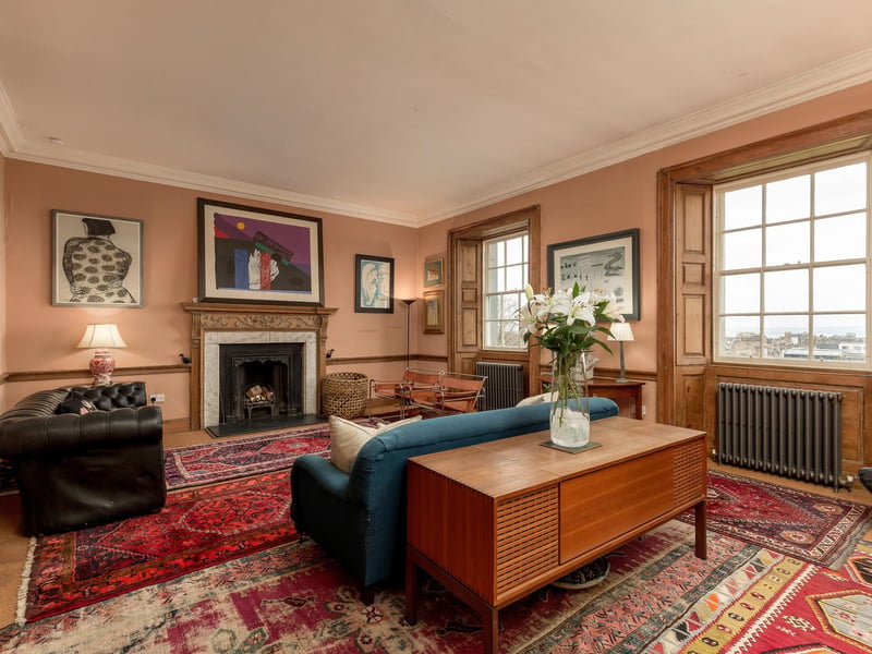 Interior: The home is packed with original period features and comprises a sitting room and library/ third bedroom on the ground floor,
two bedrooms and kitchen with French doors on the garden level, and a fourth bedroom, additional sitting room, and study on the third.