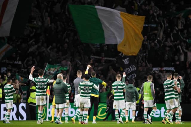 The Celtic players take the acclaim of their fans after the 2-1 win over Ross County.