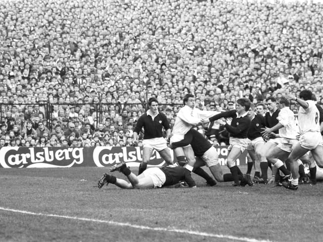 Packed terraces of fans enjoy the action.