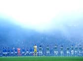 Rangers and Celtic players take part in a minute's applause. The build-up to the Scottish League Cup final has been marred by fighting between the fans of both clubs. Picture: Jane Barlow/PA Wire