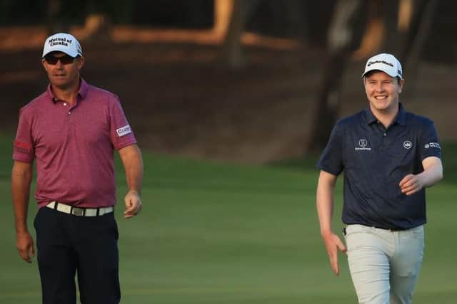 Padraig Harrington and Bob MacIntyre during the second round of last week's Abu Dhabi HSBC Championship. Picture: Andrew Redington/Getty Images.