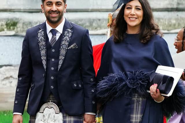 First Minister of Scotland Humza Yousaf and wife Nadia El-Nakla leave Westminster Abbey following the coronation ceremony of King Charles III and Queen Camilla in central London.