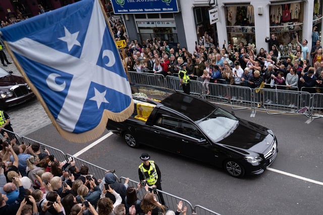 The Queens coffin travels down the Royal Mile in Edinburgh