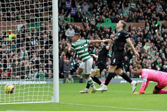 Hibs' Paul Hanlon and David Marshall are left dejected by Giorgios Giakoumakis' goal to make it 2-0.