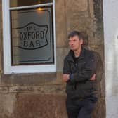 Author Ian Rankin outside The Oxford Bar.