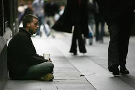 A homeless man begs for small change on the streets. Photo: Getty Images