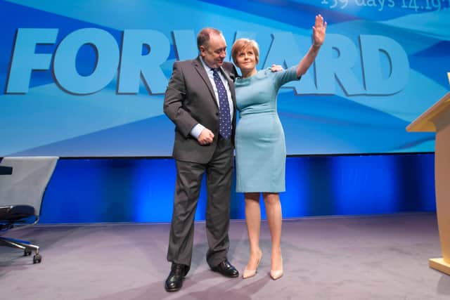 Nicola Sturgeon pictured in April 2014 with the then First Minister Alex Salmond at the SNP spring conference in Aberdeen (Picture: Jane Barlow)