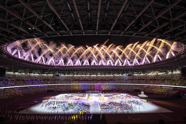 Fireworks light up the sky above the Olympic Stadium during the closing ceremony for the Tokyo 2020 Paralympic Games. (Photo by CHARLY TRIBALLEAU/AFP via Getty Images)