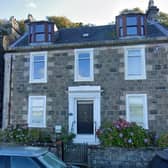 This Victorian attic flat has no gas connection but does have electricity and running water, and is in a mansion-style fronted house with views over Rothesay Bay.