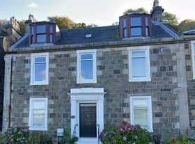 This Victorian attic flat has no gas connection but does have electricity and running water, and is in a mansion-style fronted house with views over Rothesay Bay.