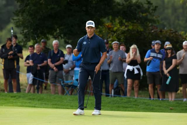 Calum Hill of Scotland reacts after a par putt on the 17th green in the final round of the Cazoo Classic at the London Golf Club. Picture: Andrew Redington/Getty Images.