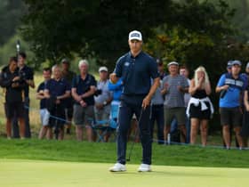 Calum Hill of Scotland reacts after a par putt on the 17th green in the final round of the Cazoo Classic at the London Golf Club. Picture: Andrew Redington/Getty Images.
