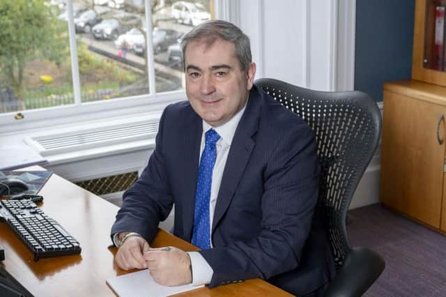 Jim Galbraith in the offices of financial mutual Scottish Friendly.