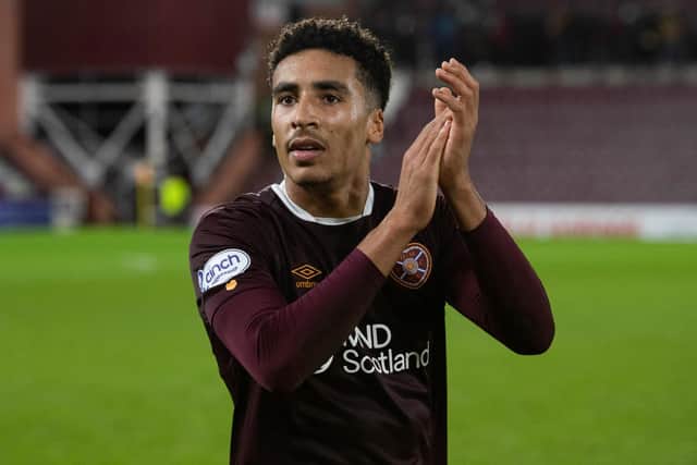James Hill applauds the fans after his Hearts debut. Picture: SNS