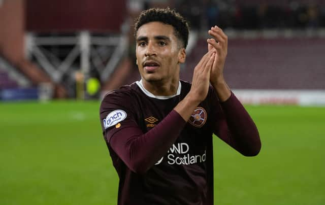 James Hill applauds the fans after his Hearts debut. Picture: SNS