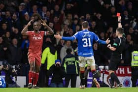 Aberdeen captain Anthony Stewart is sent off for a shocking tackle on Rangers' Fashion Sakala.