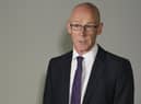 John Swinney has said that the Scottish Government will act ‘very swiftly’ when JCVI advice is published next week as he denied that Scotland is becoming an ‘outlier’ in the easing of Covid restrictions.