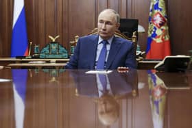Russian president Vladimir Putin listens to speaker of the State Duma at the Kremlin in Moscow, Russia. Picture: Alexander Kazakov, Sputnik, Kremlin Pool Photo via AP